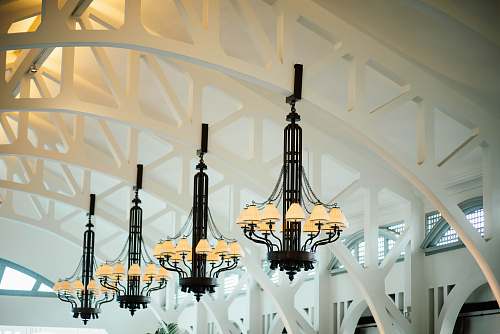 light fixture four black-and-white chandeliers inlined hang in white ceiling lantern